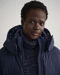 Kokopitkä untuvatakki