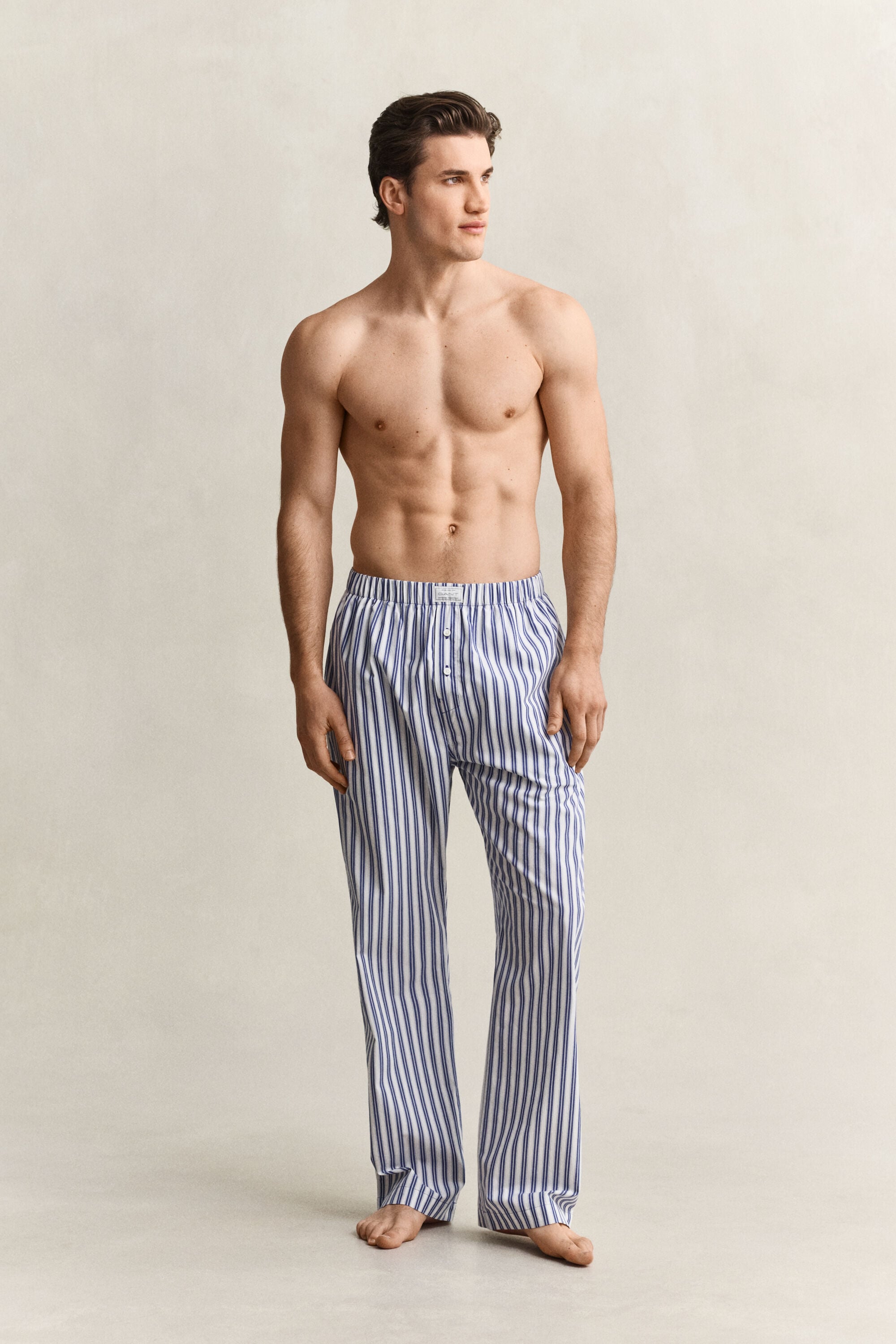 Raidalliset pyjamahousut