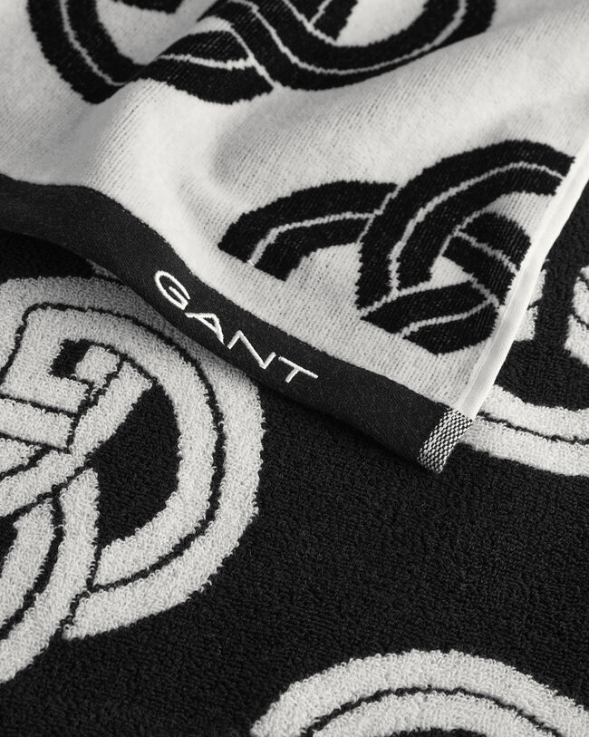 Printtikuvioitu Monogram-rantapyyhe