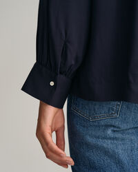 Relaxed fit ‑mitoitettu pusero leveillä kalvosimilla