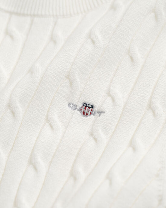 Joustopuuvillainen palmikkoneulepusero