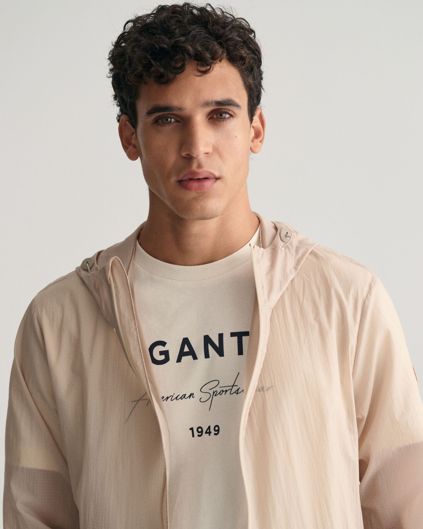 Taskuun pakattava kevyt Windbreaker-takki