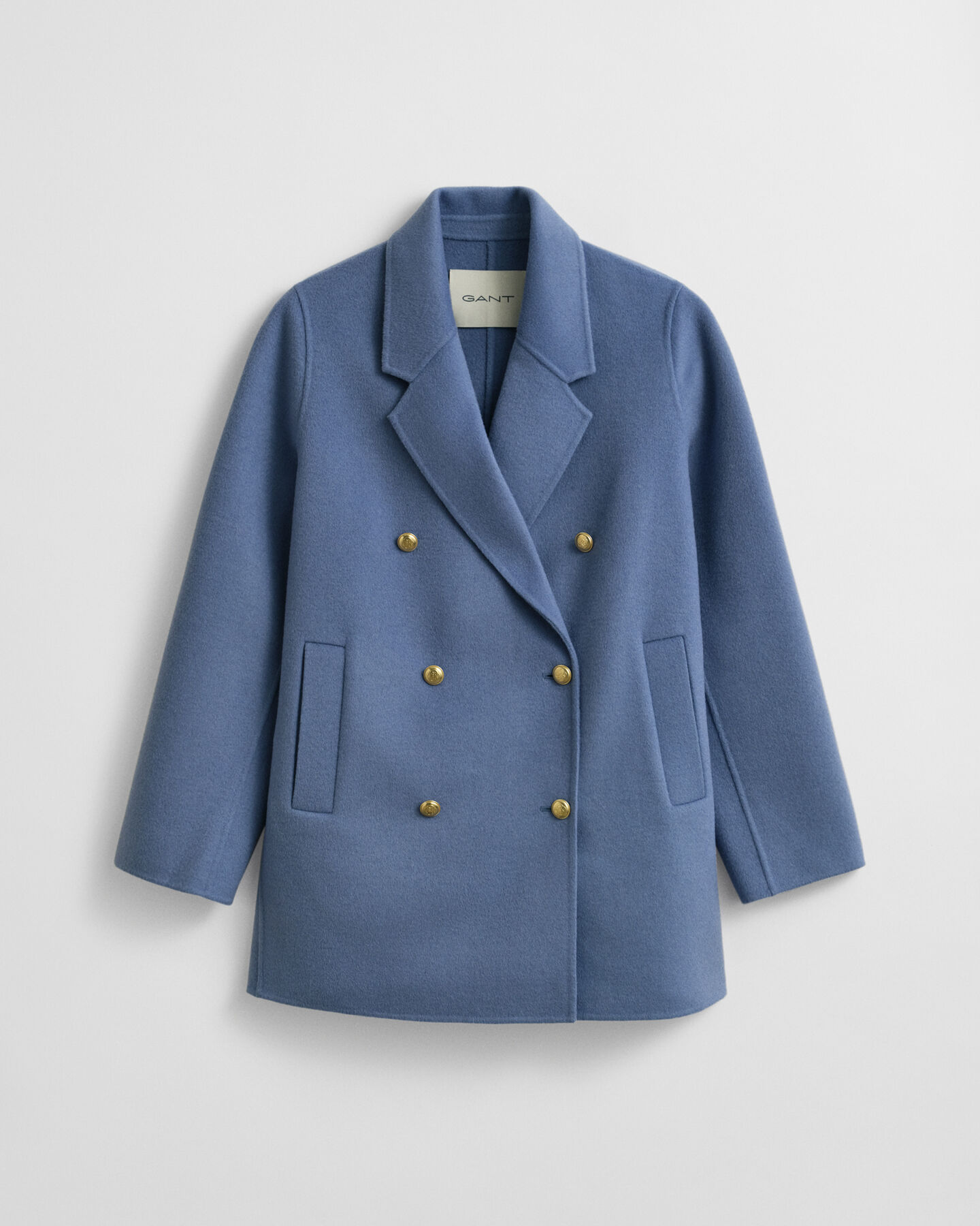 Käsin tikattu kansitakki