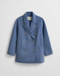 Käsin tikattu kansitakki