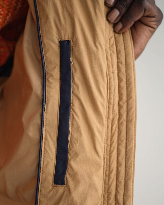 Kokopitkä untuvatakki