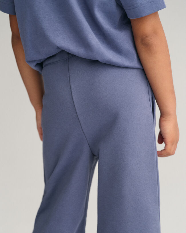 Girls-malliston leve&auml;lahkeiset jerseyhousut