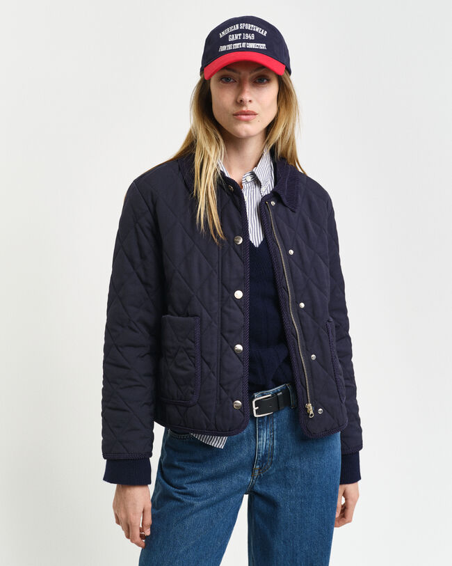 Vakosamettisomisteinen tikkitakki