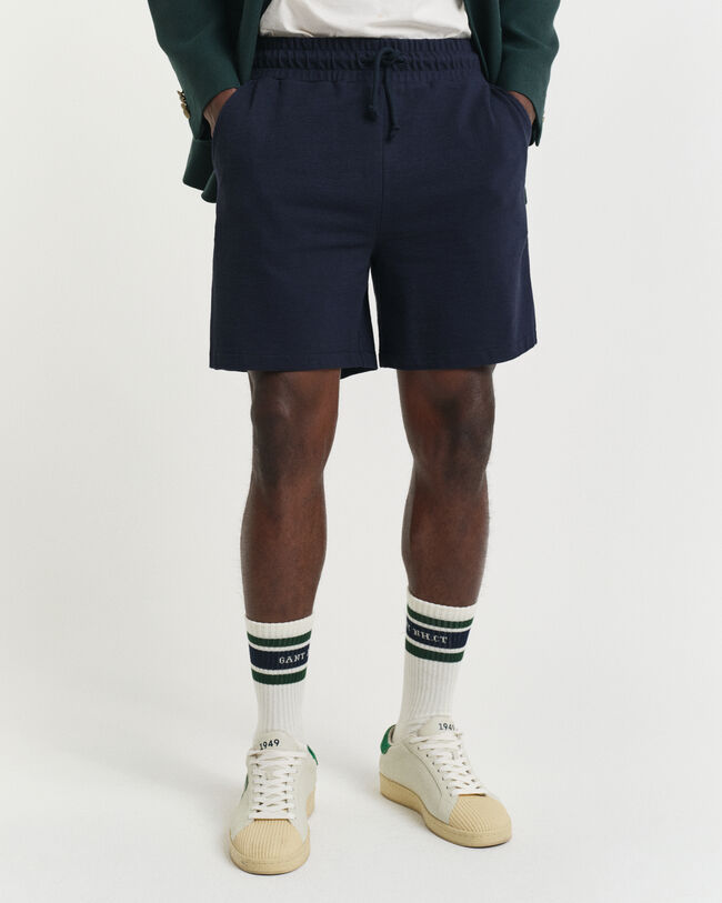 Kohopintaiset shortsit