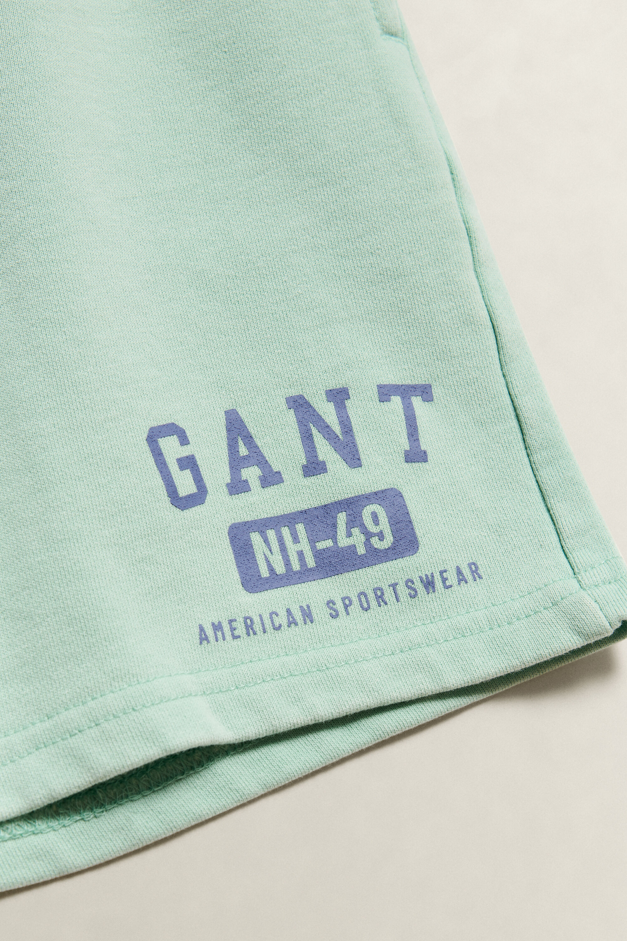 Teen Boys ‑malliston pesukäsitellyt collegeshortsit