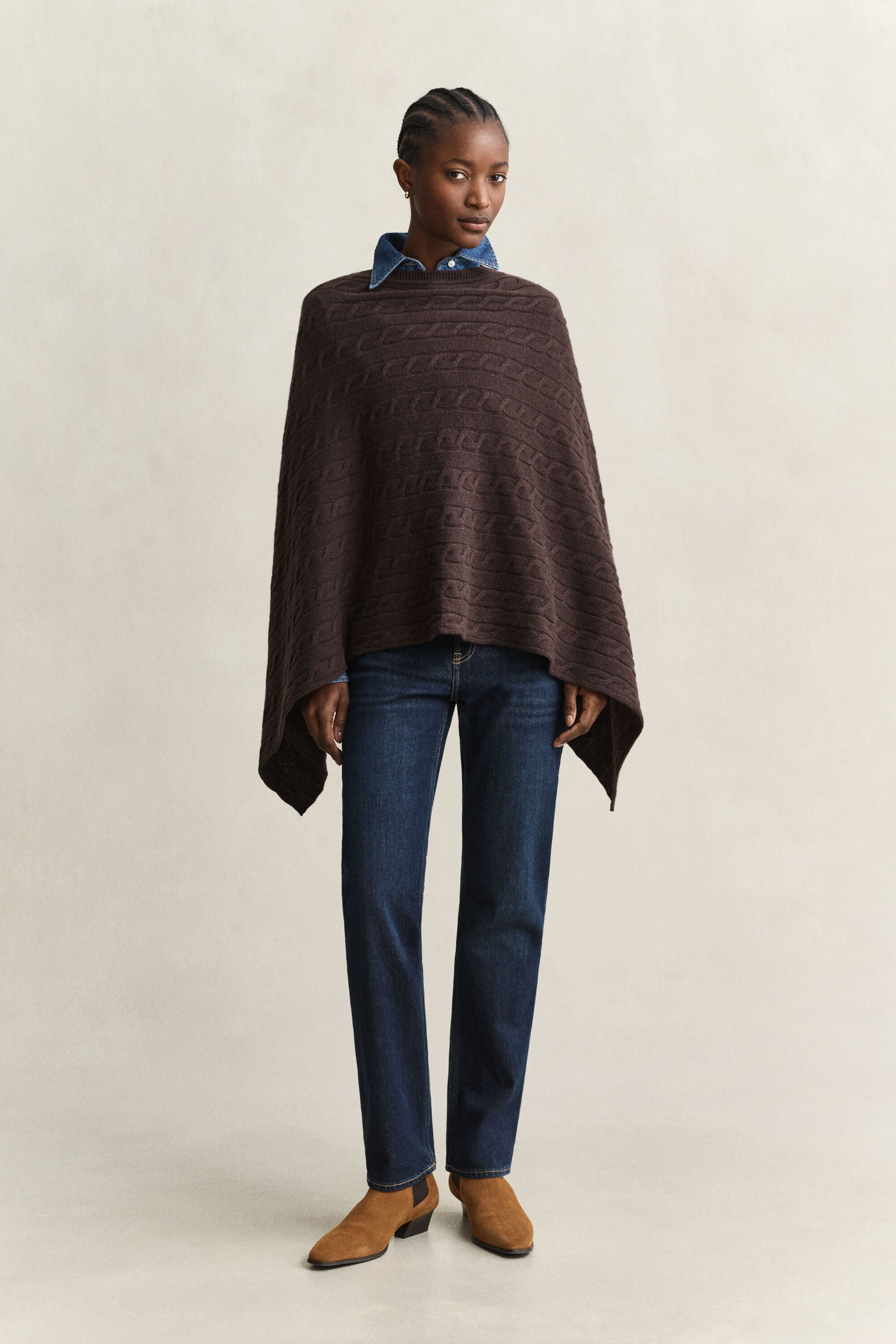 Villainen palmikkoneuleponcho