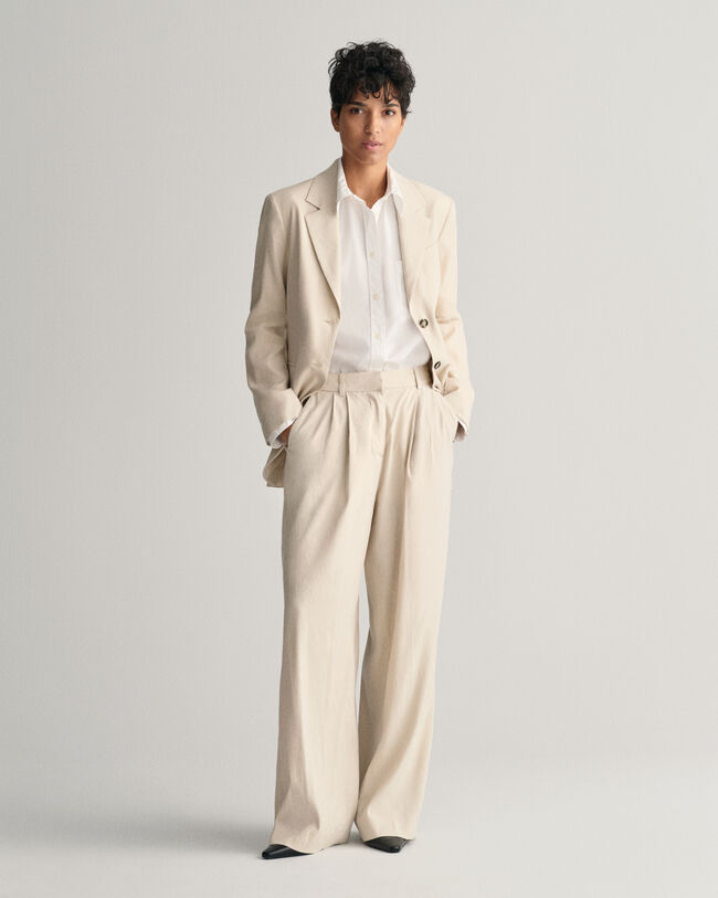 Relaxed fit ‑mitoitetut huolitellut joustopellavahousut