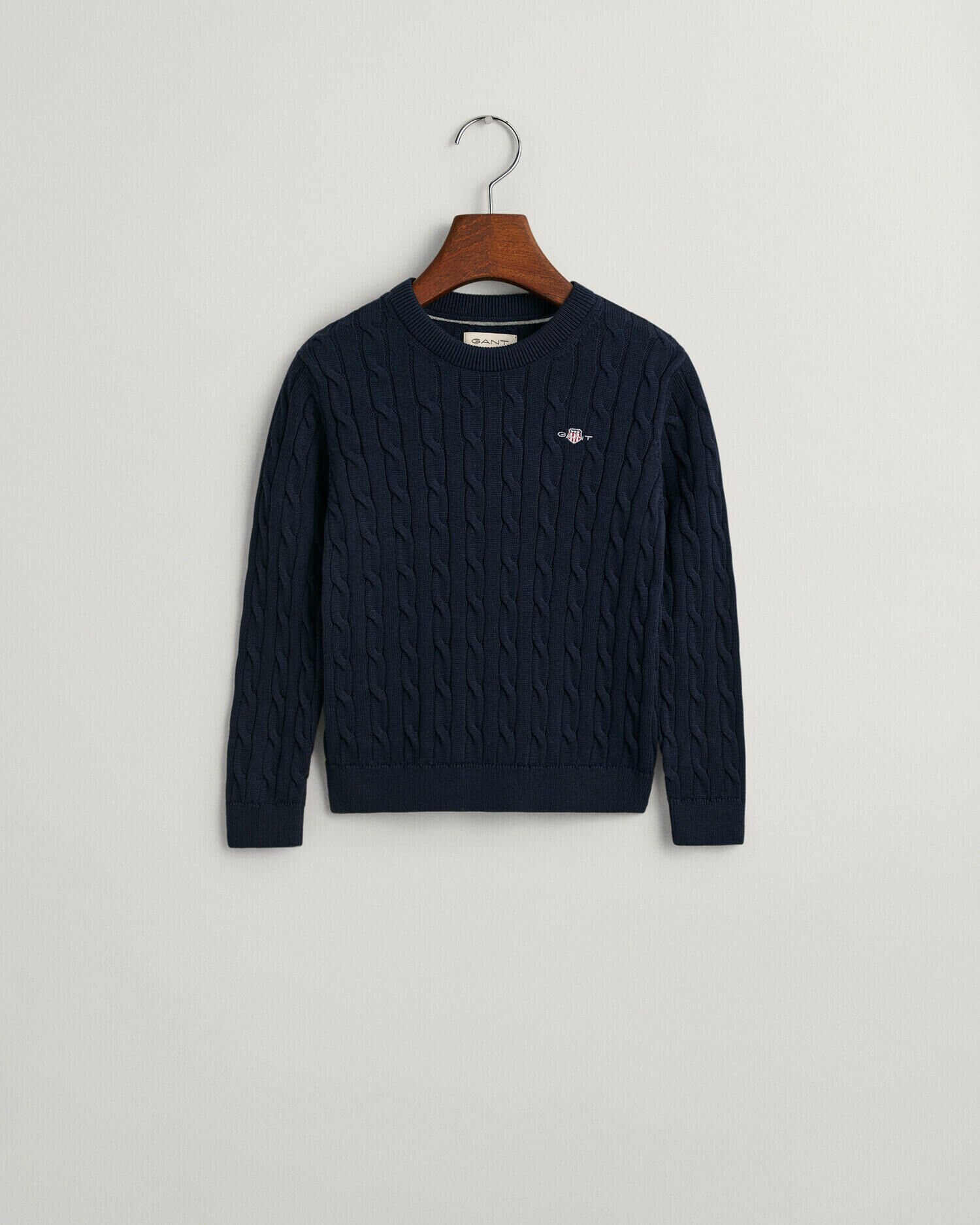 Kids-malliston puuvillainen Shield-palmikkoneulepusero, jossa pyöreä pääntie