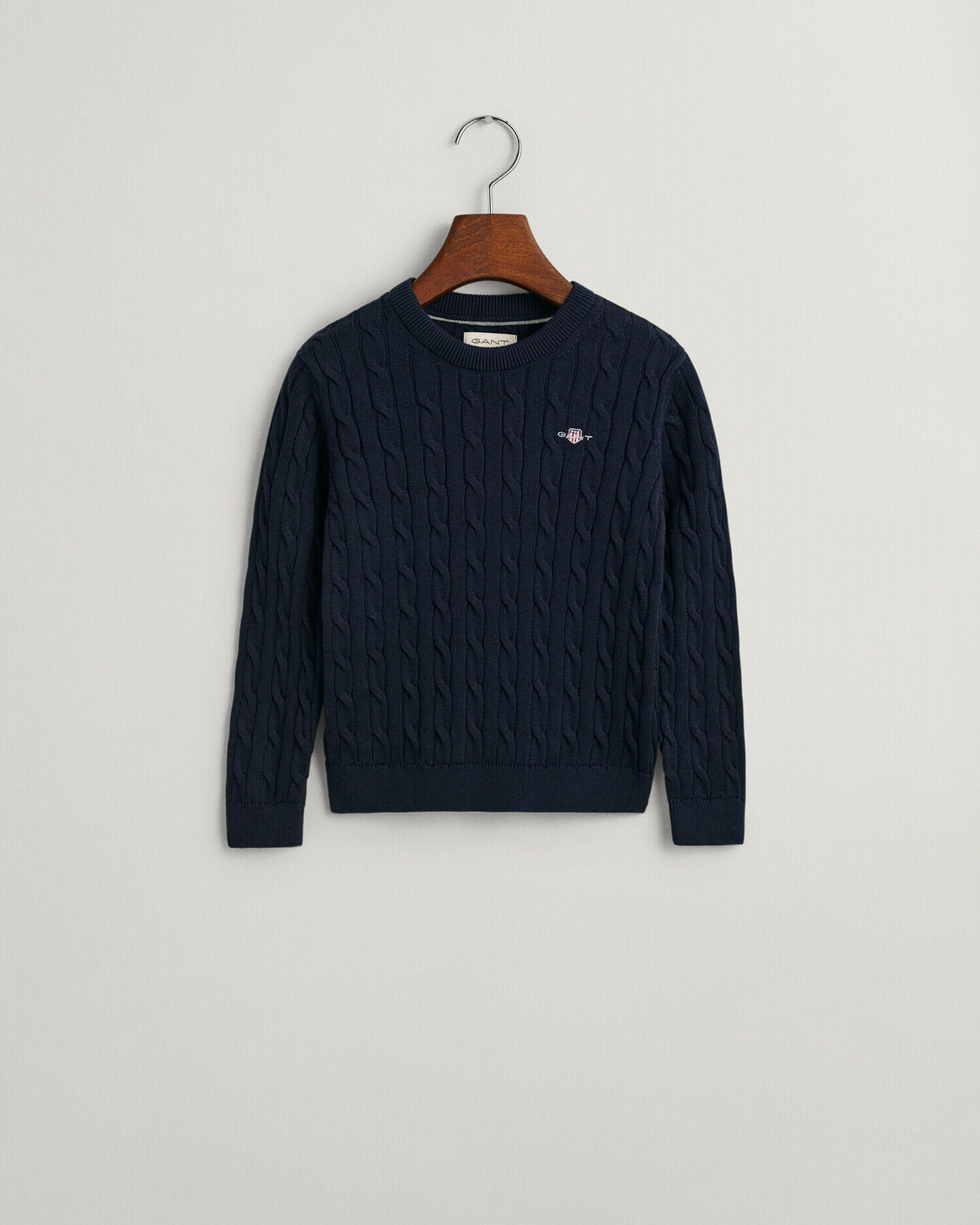 Kids-malliston puuvillainen Shield-palmikkoneulepusero, jossa pyöreä pääntie