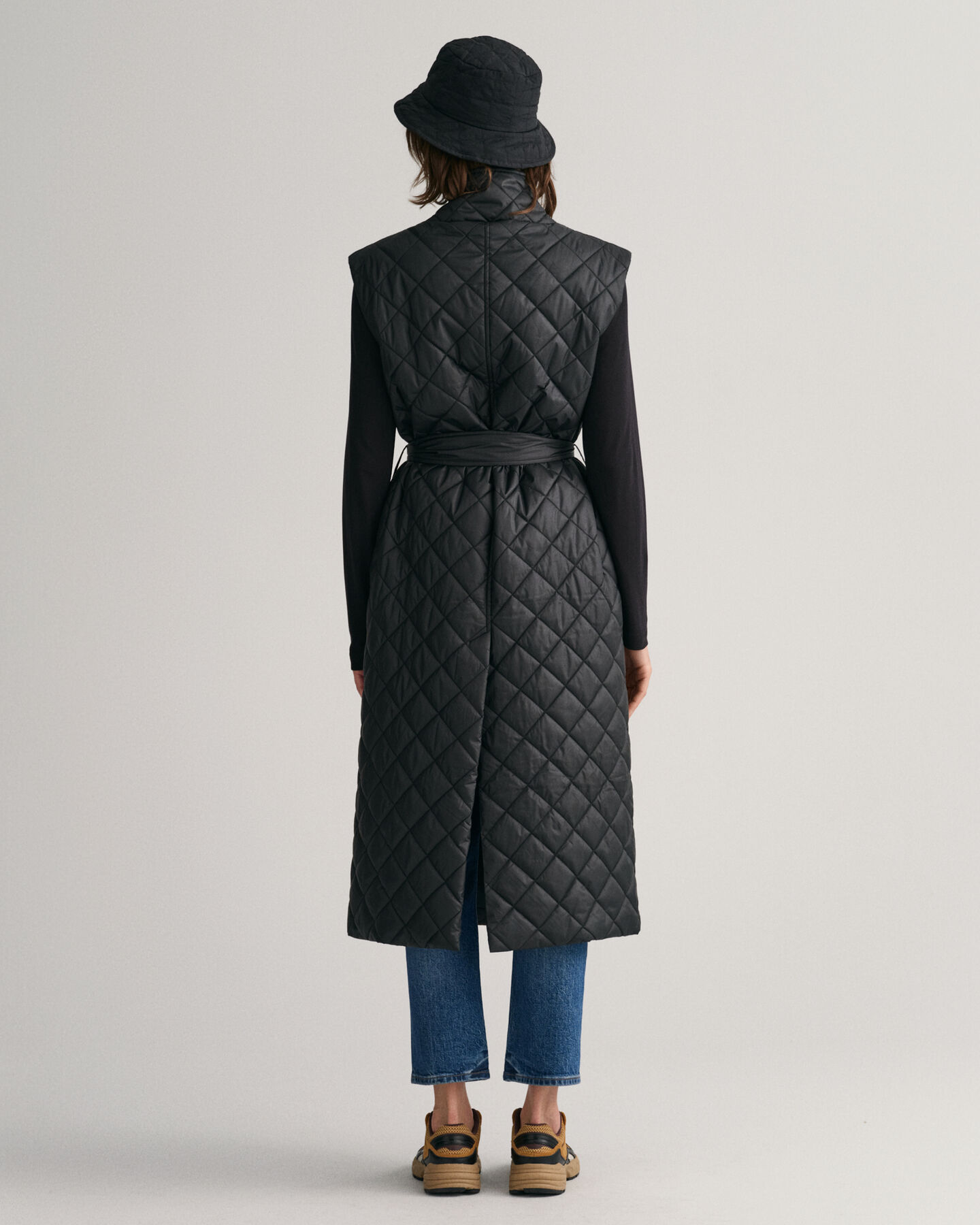 Pitk&auml; tikkiliivi