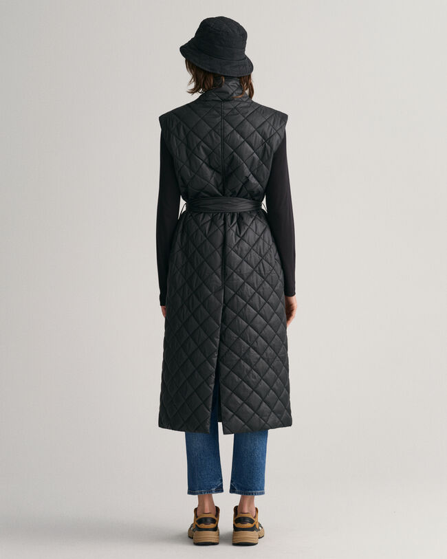 Pitk&auml; tikkiliivi