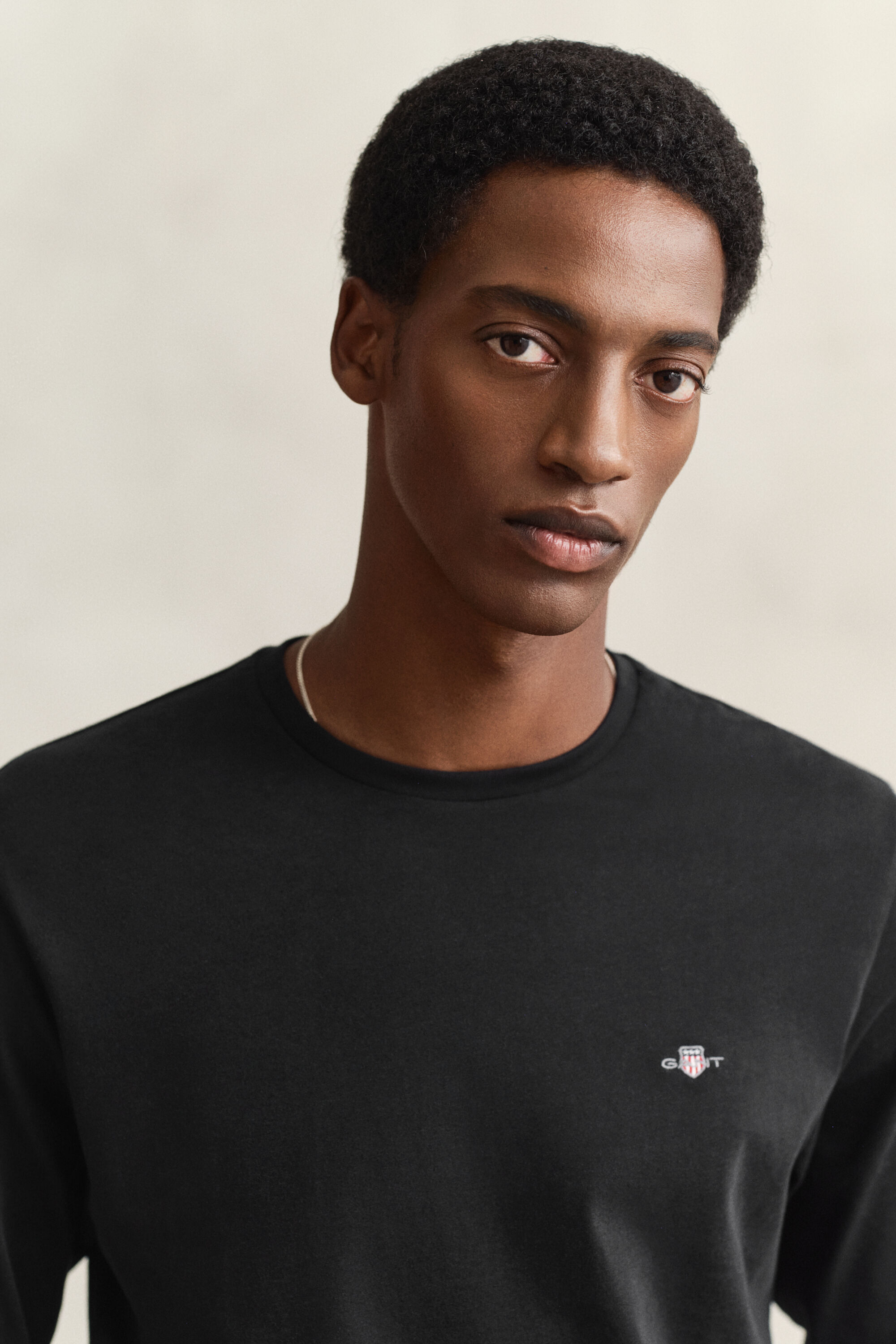 Pitkähihainen Shield-t‑paita