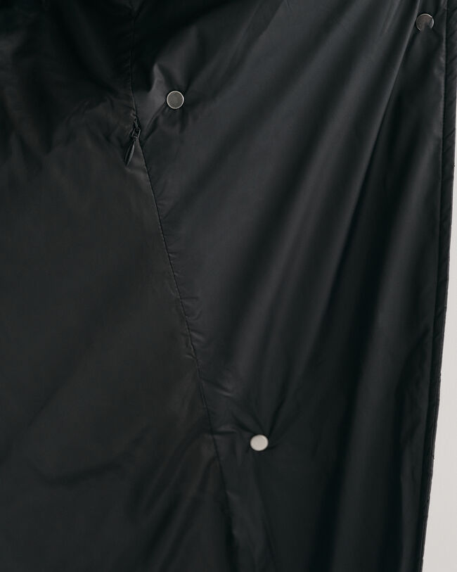 Pitk&auml; tikkiliivi