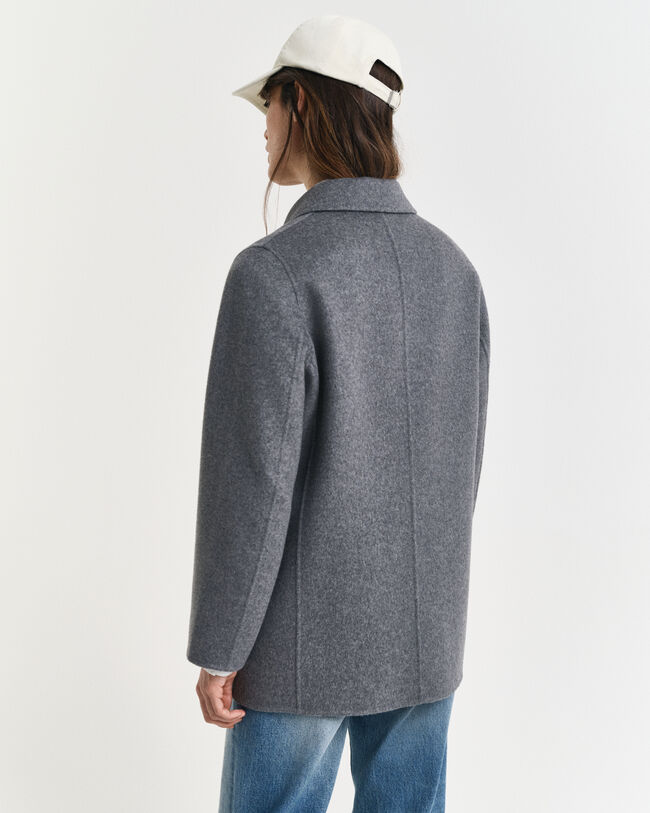 Käsin tikattu kansitakki