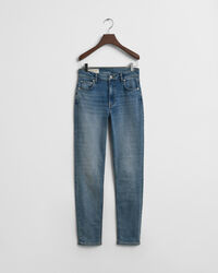 Slim fit ‑mitoitetut erittäin joustavat farkut