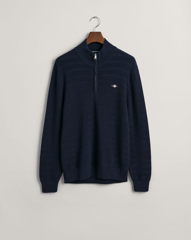 Raidallinen kohopintainen vetoketjukauluksellinen puuvillaneule