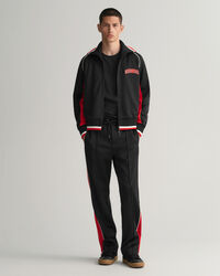 Monivärinen verryttelytakki