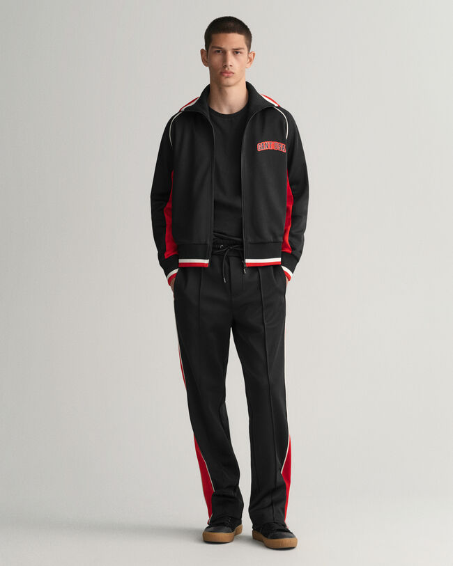 Monivärinen verryttelytakki