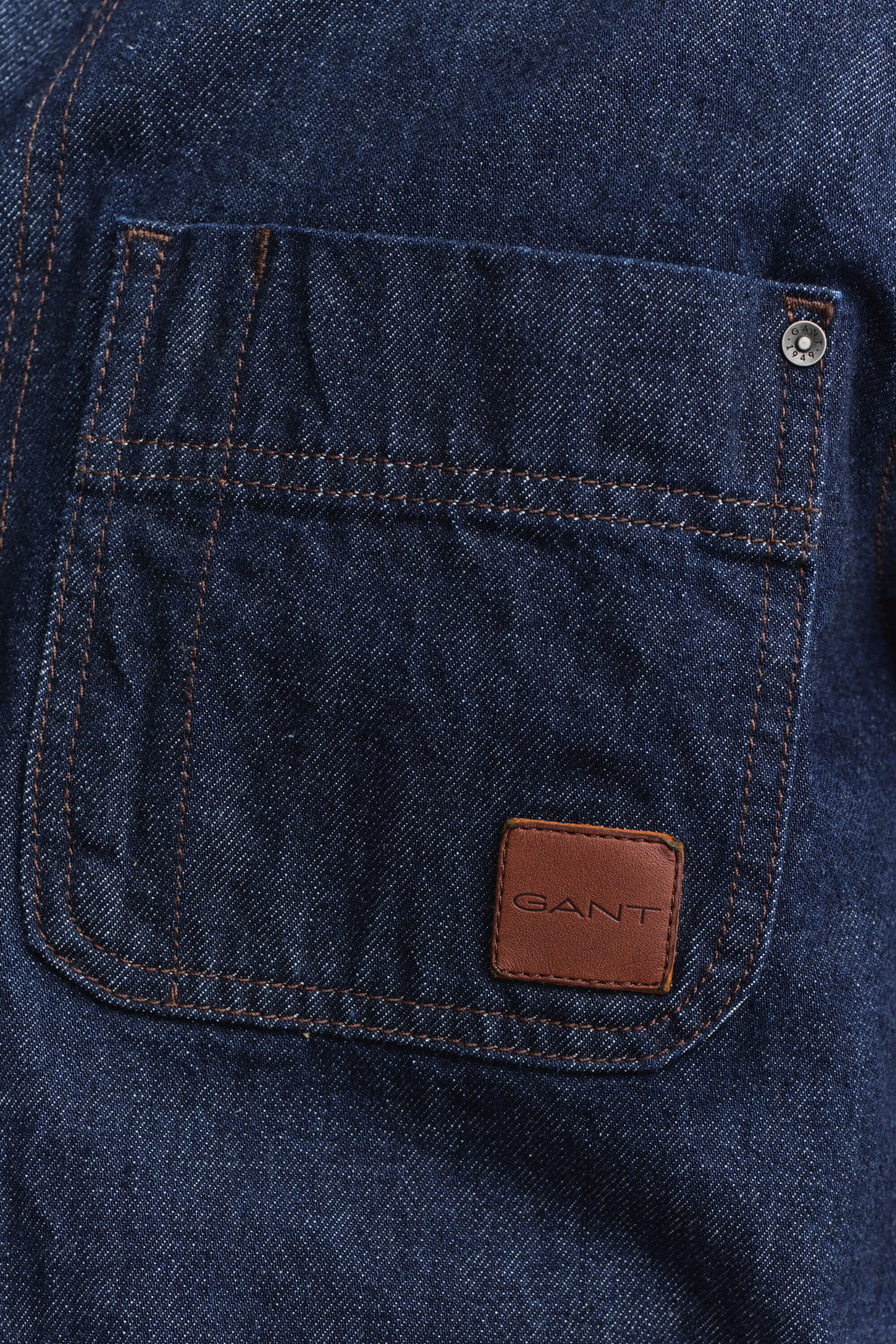 Indigonsininen työtakki