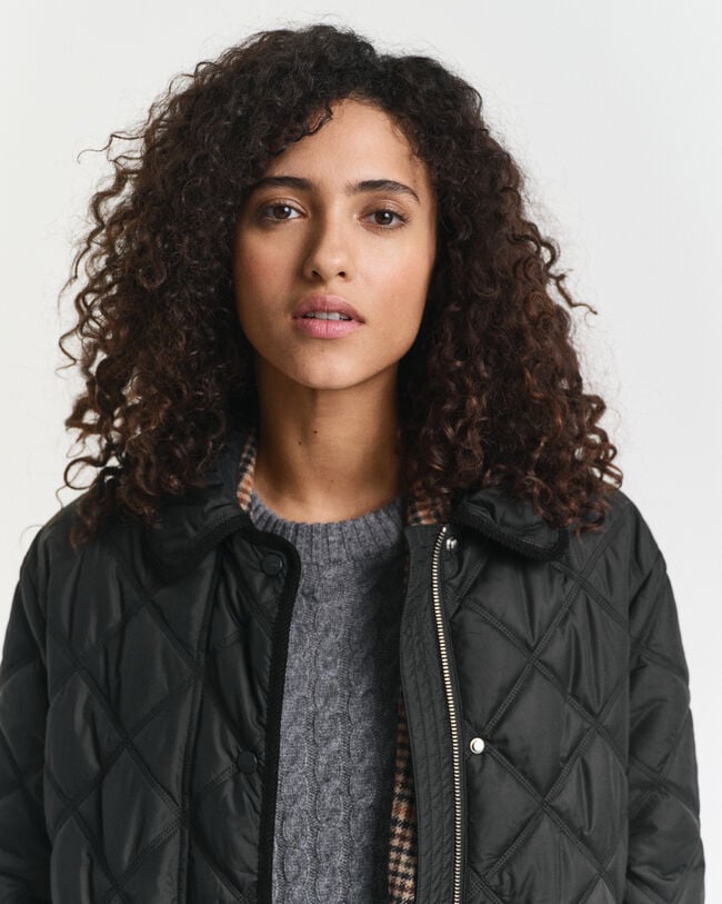 Vakosamettisomisteinen tikkitakki