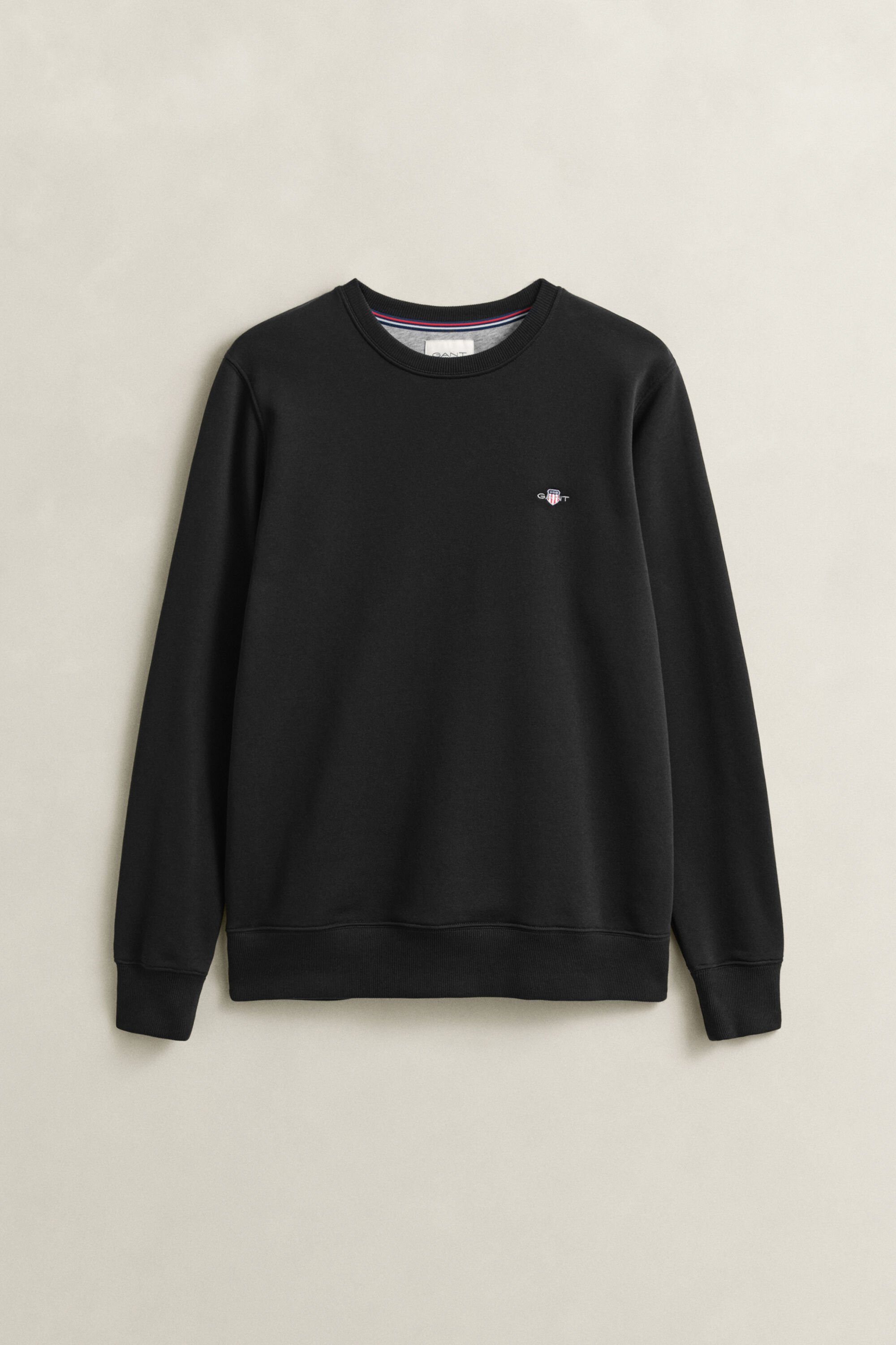 Shield-collegepaita, jossa pyöreä pääntie