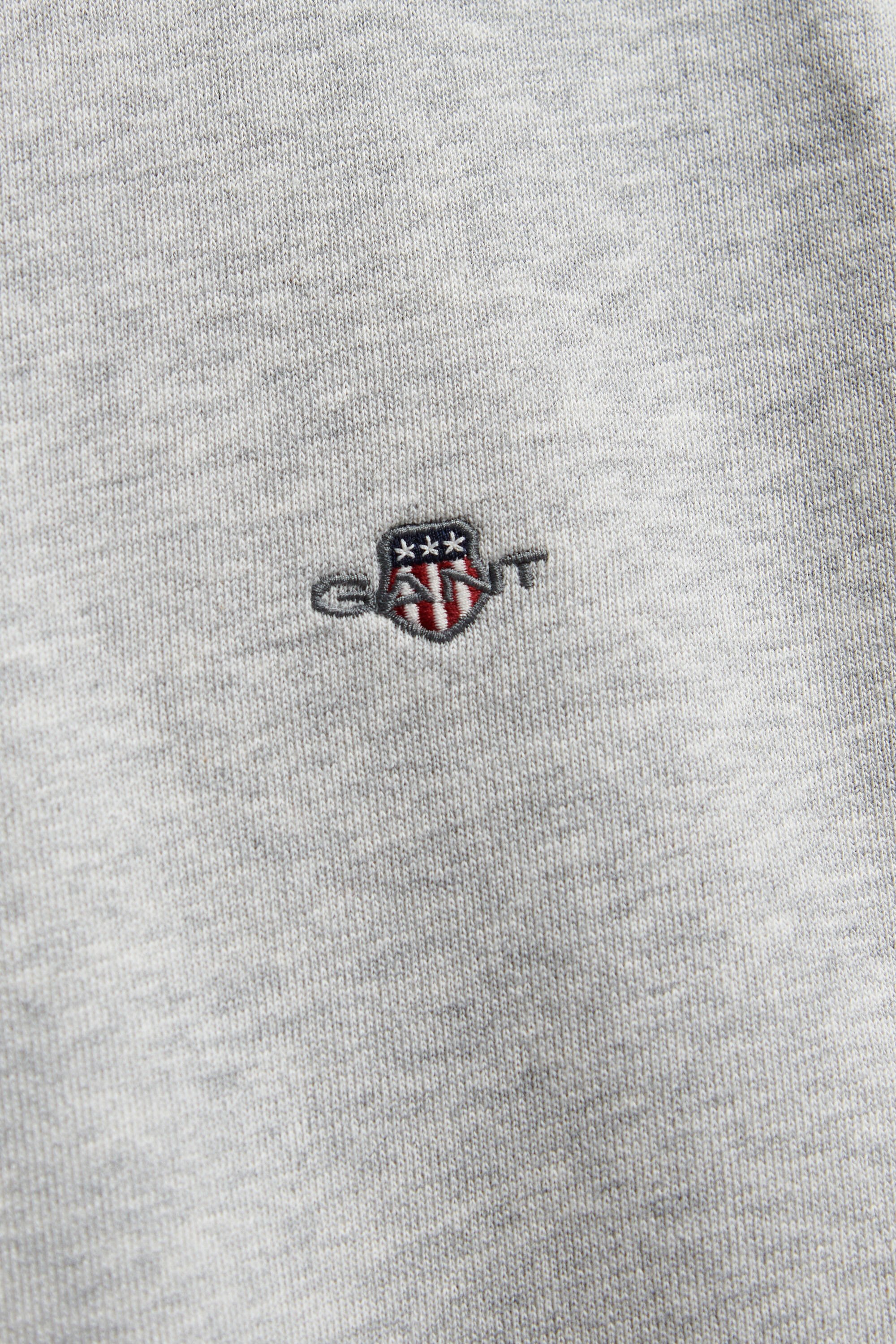 Teens‑malliston Shield-collegepaita