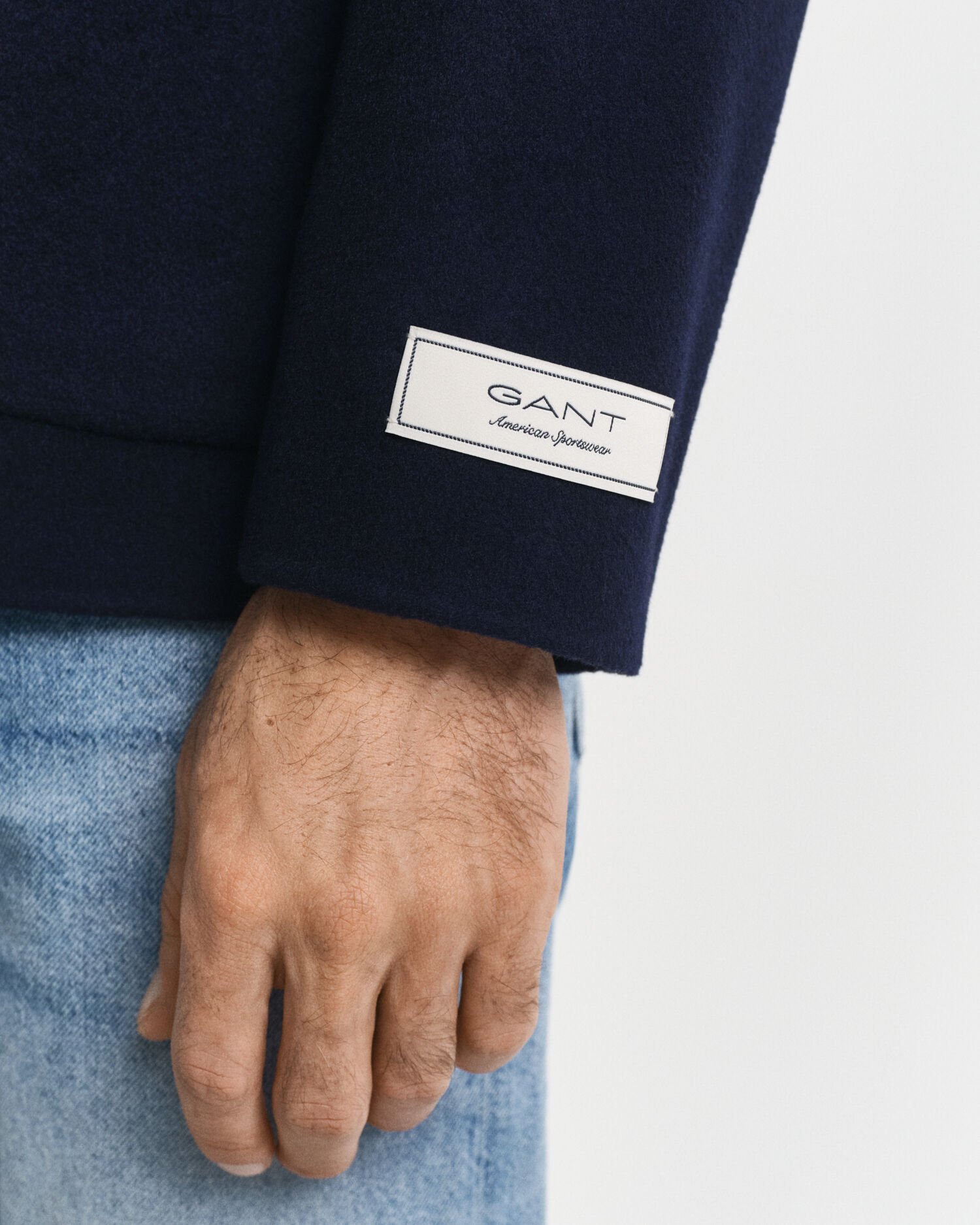 Käsin tikattu klubitakki