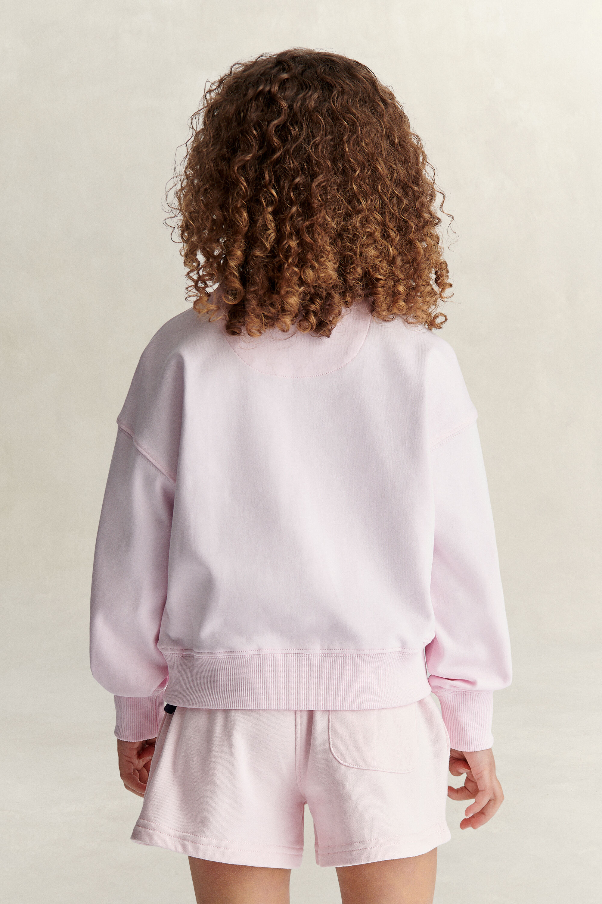 Girls-malliston oversized fit ‑mitoitettu Shield-collegepaita