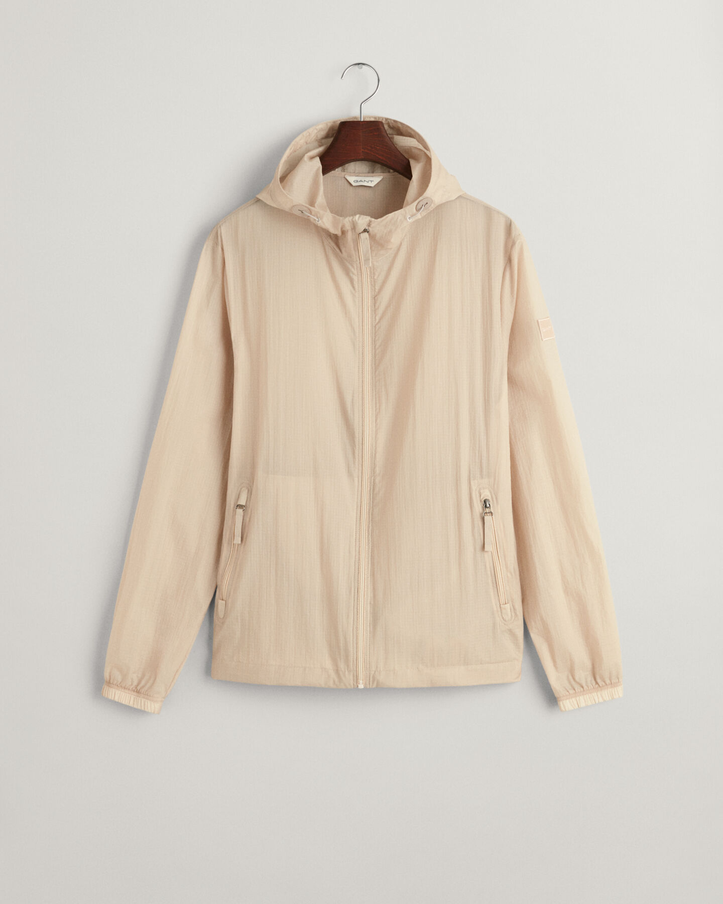 Taskuun pakattava kevyt Windbreaker-takki