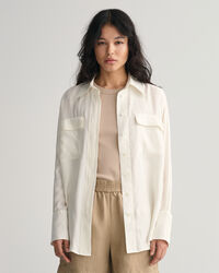 Relaxed fit ‑mitoitettu taskullinen paita