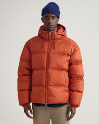 Kiiltävä toppatakki