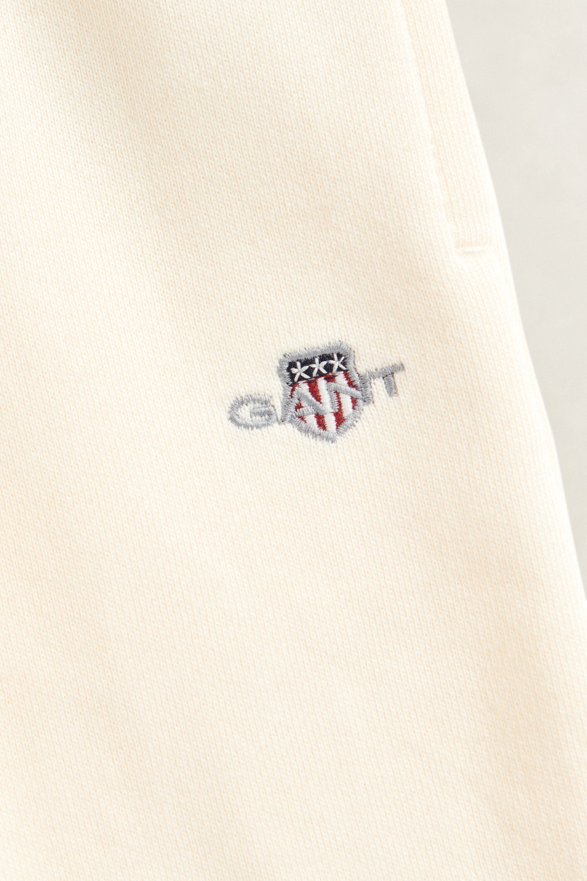 Girls-malliston Shield-huppari ja collegehousut