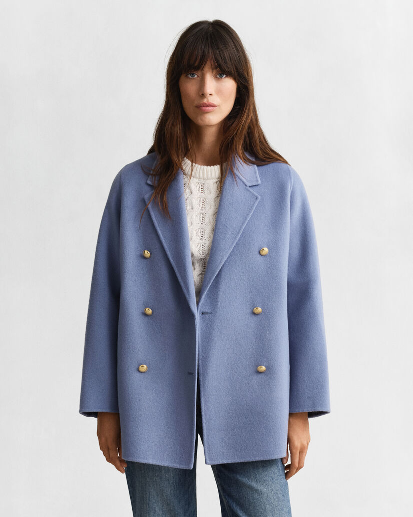 Käsin tikattu kansitakki