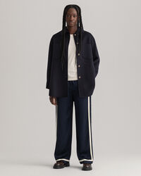 K&auml;sin tikattu paitatakki