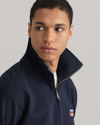 Retro Flag ‑neulepusero puolivetoketjulla