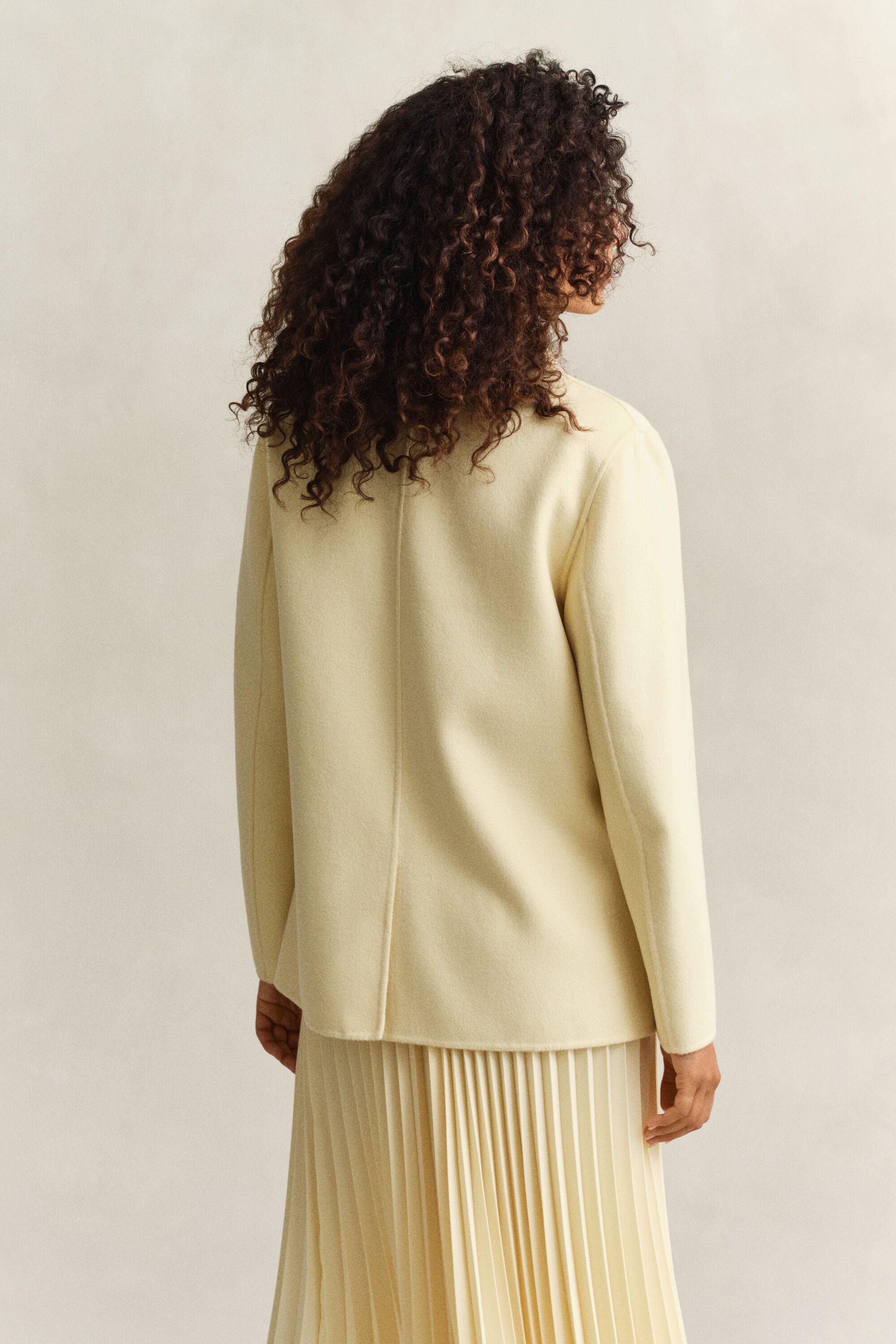 Käsin tikattu klubitakki