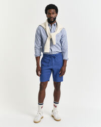 Relaxed fit ‑mitoitetu kiristysnyörilliset pellavashortsit