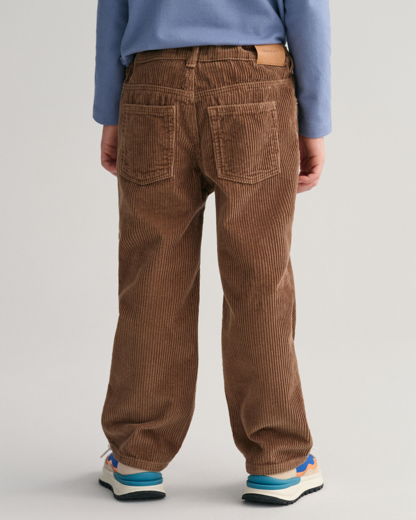 Kids-malliston Relaxed fit ‑mitoitetut vakosamettihousut
