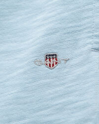 Teens-malliston slubipuuvillaiset Shield-collegeshortsit