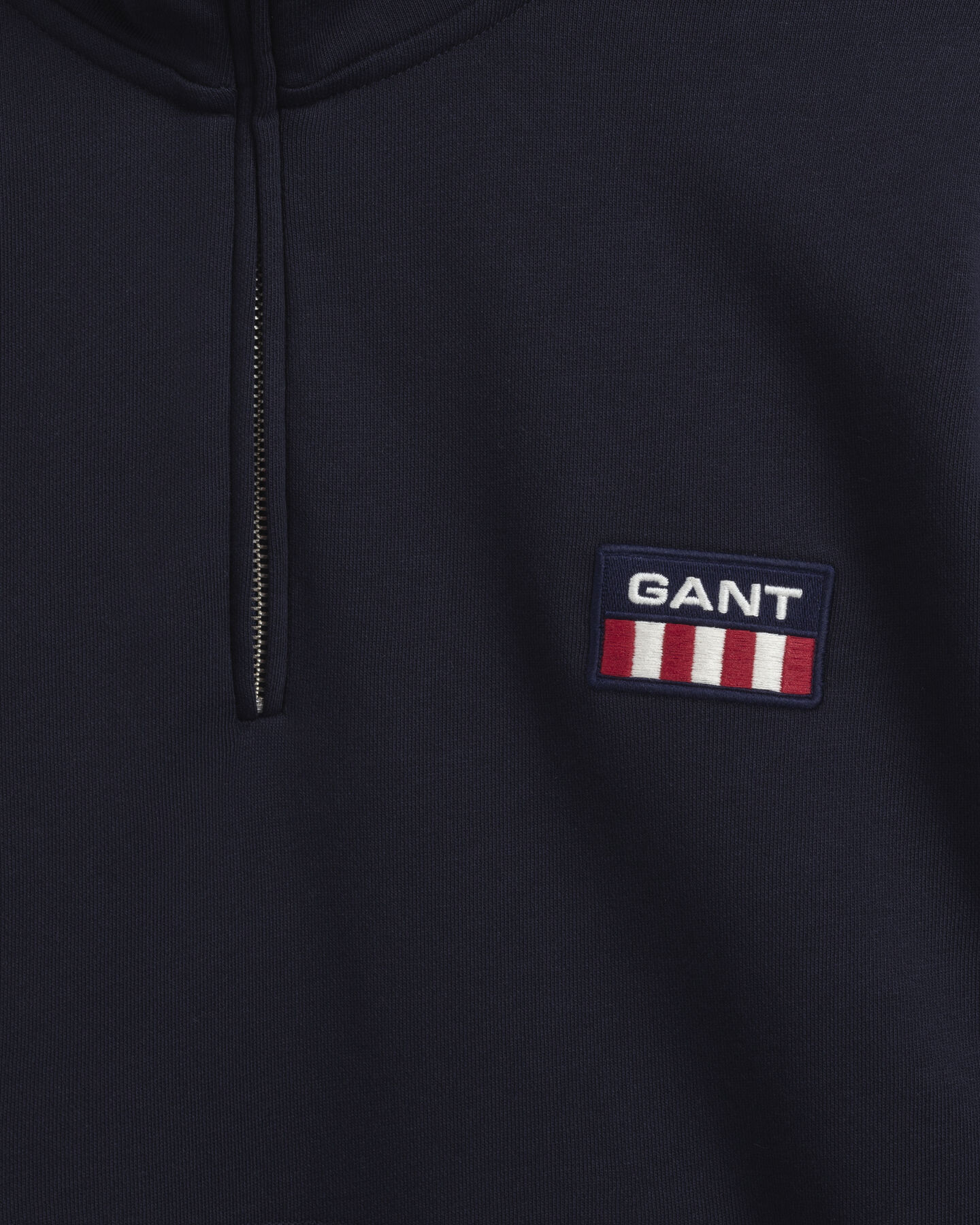 Retro Flag ‑neulepusero puolivetoketjulla