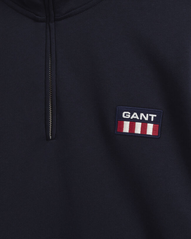 Retro Flag ‑neulepusero puolivetoketjulla