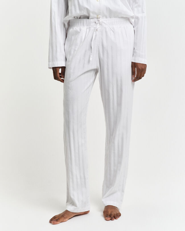 Raidallinen pyjama lahjapakkauksessa