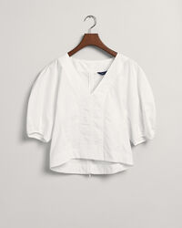 Puhvihihainen pusero, jossa v-pääntie