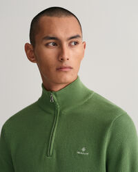 Puuvillapikeekankaasta tehty neulepusero puolivetoketjulla