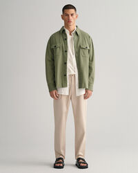 Slim fit ‑mitoitetut, laskokselliset tvillichinot