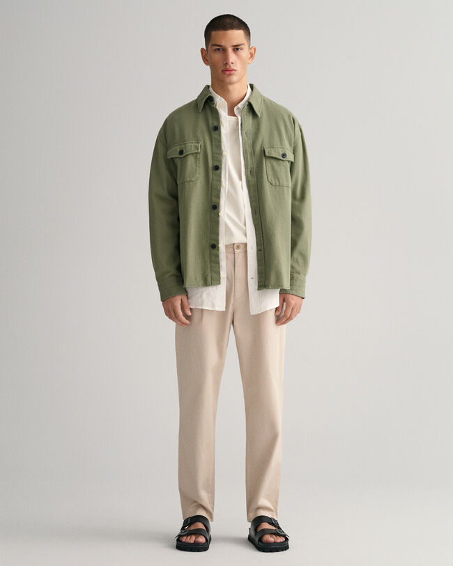 Slim fit ‑mitoitetut, laskokselliset tvillichinot